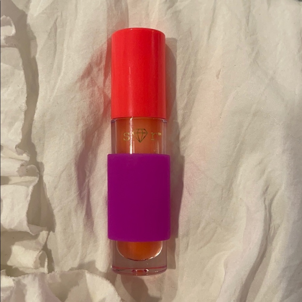 Tarte clear/light pink lip gloss